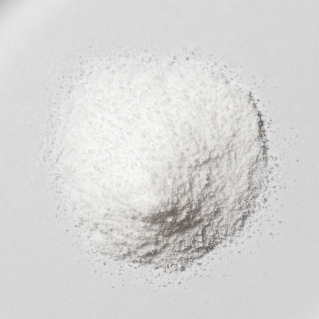 White neotes betaine TMG powder in close-up on a light background