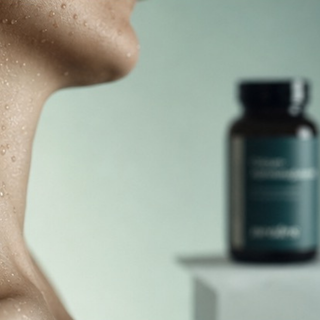 Close-up of skin and neck as a lifestyle image for calcium alpha-ketoglutarate capsules