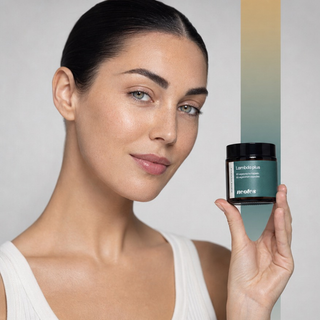 Woman holding a neotes jar of Lambda Plus capsules in a calm lifestyle scene