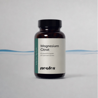 neotes magnesium citrate capsules as a packshot with a jar and graphic wave
