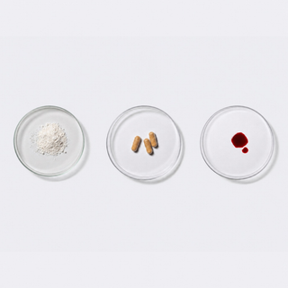 Ingredients of the neotes Inflame Bundle in Petri dishes on a light laboratory table