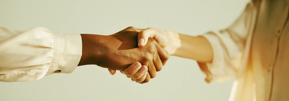 Two people shaking hands