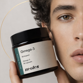 Man holding a glass jar of neotes omega-3 capsules in a bright lifestyle scene